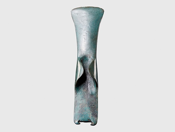 LOT 92 | MIDDLE BRONZE AGE PALSTAVE AXE | WESTERN EUROPE, C. 1200 B.C. cast copper alloy, with short winged flanges and a flaring blade 15cm long | £300 - £500 + fees